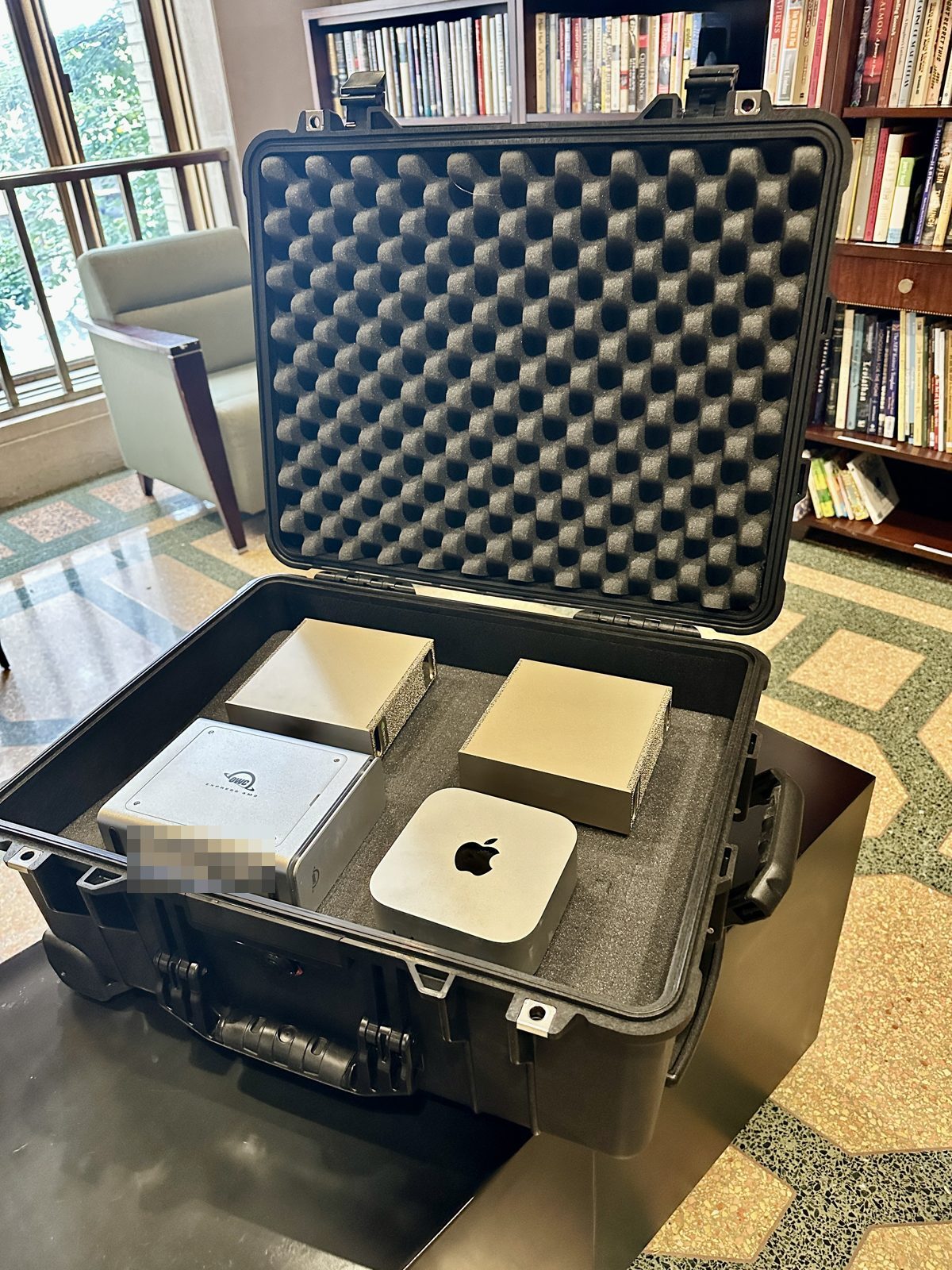 Target configuration: two NVIDIA DGX Sparks and a Mac Studio with up to 512 GB provide up to 768 GB of combined memory across the machines, alongside a 32 TB NVMe enclosure. That raw storage is about 1.6 times the historical text-only Library of Congress estimate, before indexing. NVIDIA Nemotron, Google's TurboQuant and Qdrant support Toryx's searchable archive. The photographed prototype uses a Mac Mini.